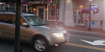 A car driving down Blacksburg's main street